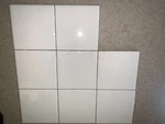 One (1) American Olean Dal Tile 1/4" Ceramic White W/ Black Speckles New. Price: $8.00.
