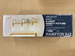 Hampton Bay Hensley 21 3-LIGHT Gold And Faux Marble Bathroom Vanity C6378 Open. Price: $38.00.