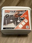 Rubi Tile Level Set W/ PLIERS+100-CAP+100-STRAP Plastic White Flooring Accessory New. Price: $39.95.