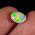 1 Ct. Natural White Ethiopian Cabochon Opal Multi Fire Loose Gemstone 8X6X3 Mm New. Price: $16.00.