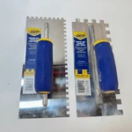 Set Of - Qep Comfort Grip 1/4" And 1/2" V Stainless Steel Trowels Used. Price: $29.99.