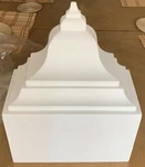 Ekena Millwork Coupling For Moulding Profiles 11"W X 5 1/2"P 13 3/4"H White Open. Price: $25.00.