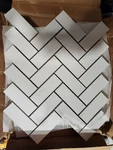 Florida Tile Home Collection Mosaic 12" X 15" Porcelain Herringbone Piece Open. Price: $48.92.