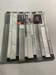Smart Tiles SM1060-4 Milano Carrera Gray Vinyl Peel & Stick Tile, 11.55X9.64, 4- Open. Price: $24.74.