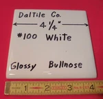 Pc. White #100 By Daltile Co. 4-1/4" Ceramic Surface Bullnose Tile; New Flat Open. Price: $5.55.