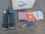 Vintage Tomechic Tile Cutter With Accessory Used. Price: $39.00.