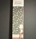 Mainstays Peel & Stick Wallpaper Floral Green White Vinyl 17.8IN X 9FT New. Price: $16.00.